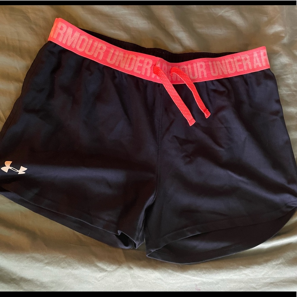 Navy blue and bright pink Under Armour shorts